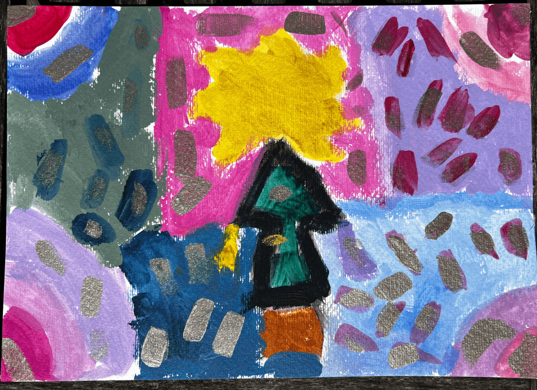 Annabel 5 I used sparkles and I painted it its a Christmas tree and its a star and theres rainbows with little stars min